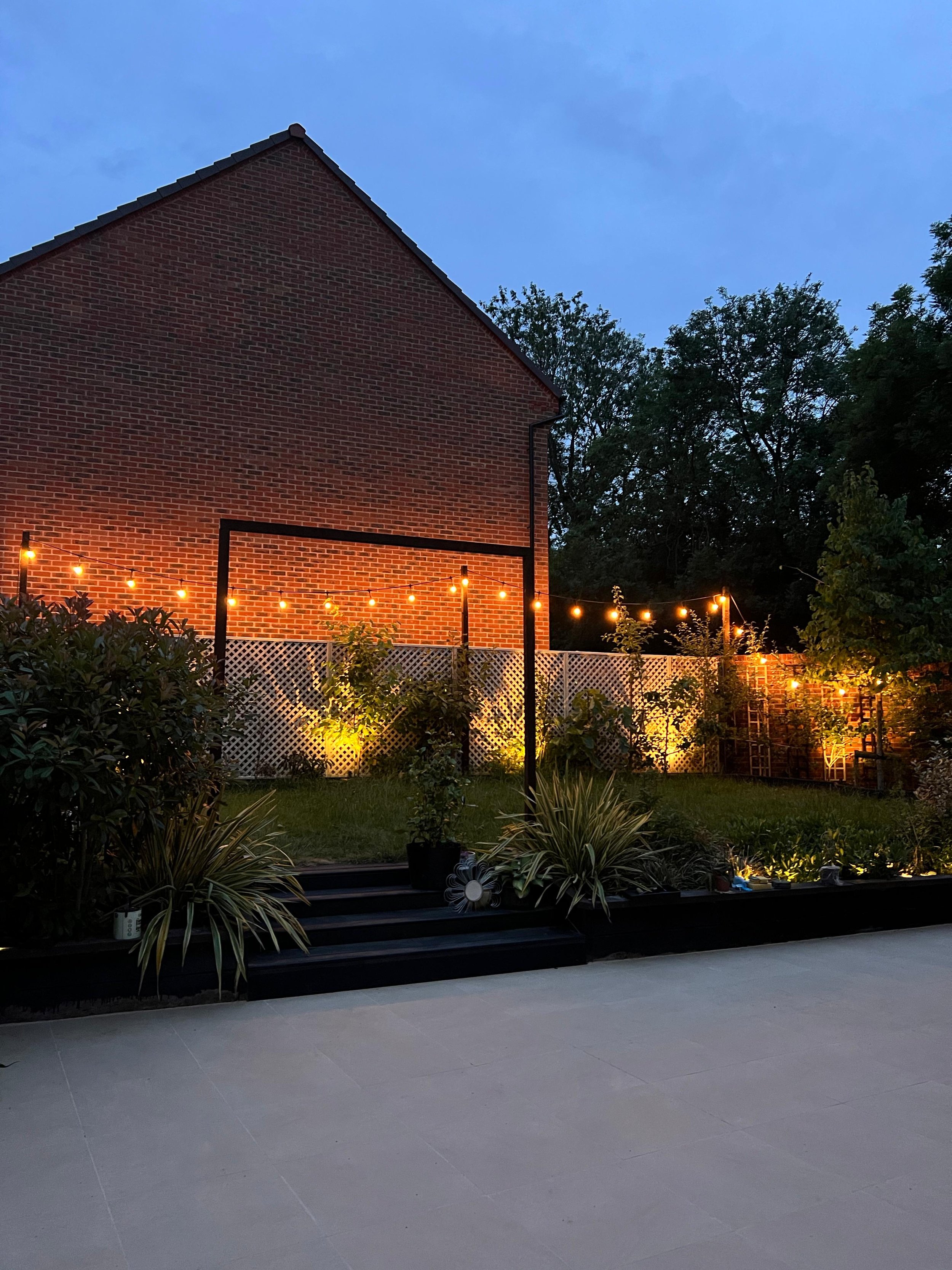 Evening garden with LED lighting and planting