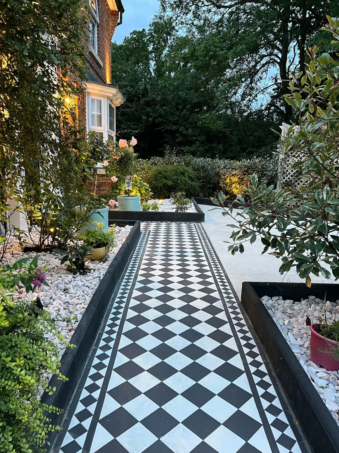 Victorian checkerboard pathway with roses