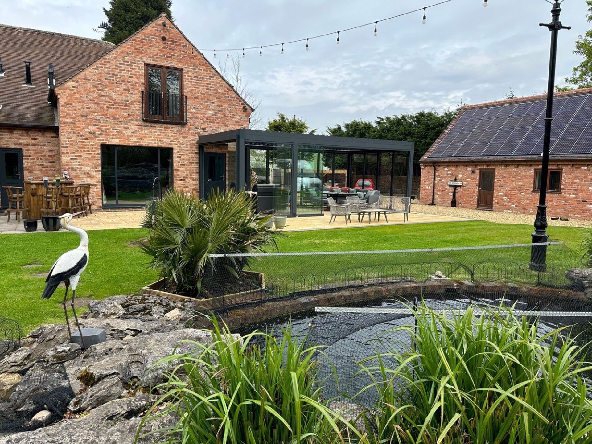 Pergola with climbing plants