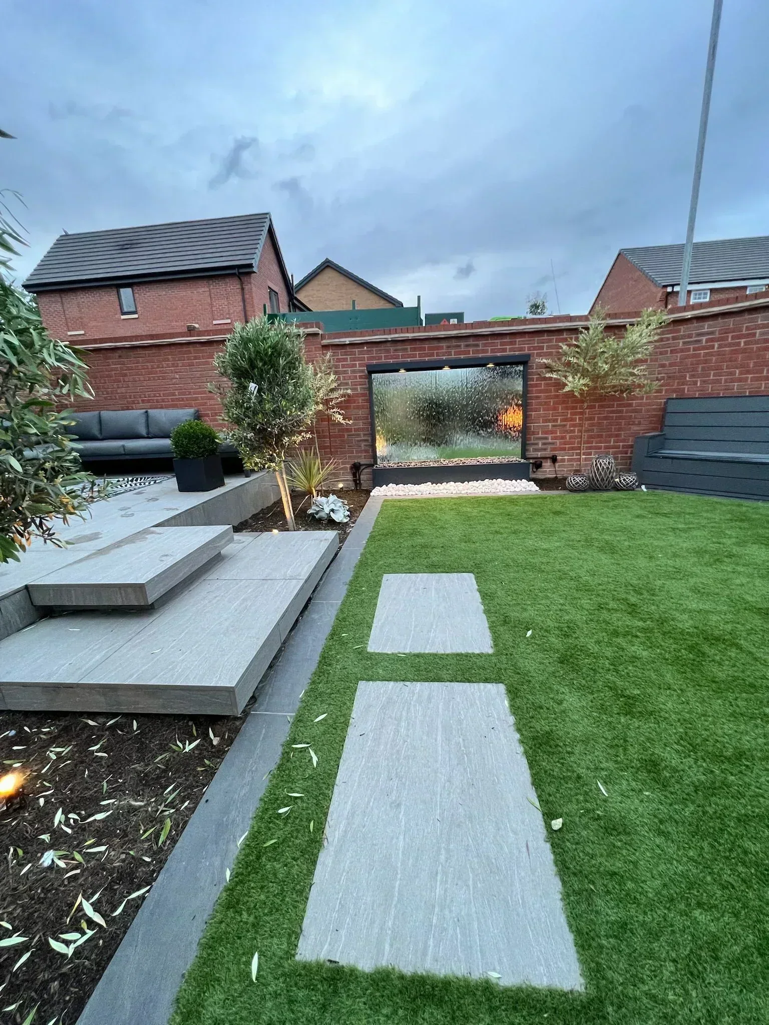 Pergola with Outdoor Kitchen & Water Feature — photo 9