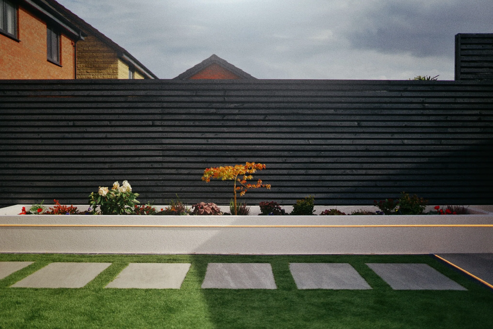 New-Build Garden with Lit Raised Planters in Didcot — photo 13